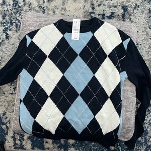 Navy blue, baby, blue, and white women’s argyle sweater. Long sleeves.